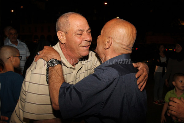 بالصور: عودة الفوج الرابع من معتمري مدينة يافا إلى ديارهم سالمين 